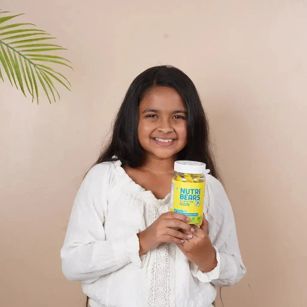 Happy child enjoying NutriBears gummies - Healthy Lifestyle